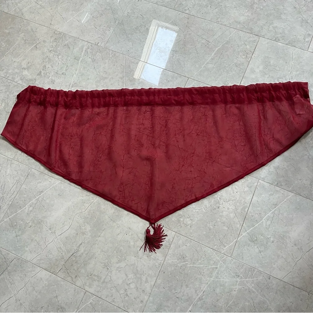 One burgundy valance for window